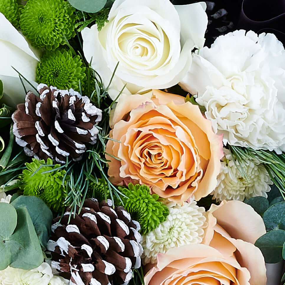 Seasonal Rose and Chrysanthemum Bouquet with Pine Cones – how the gift is presented