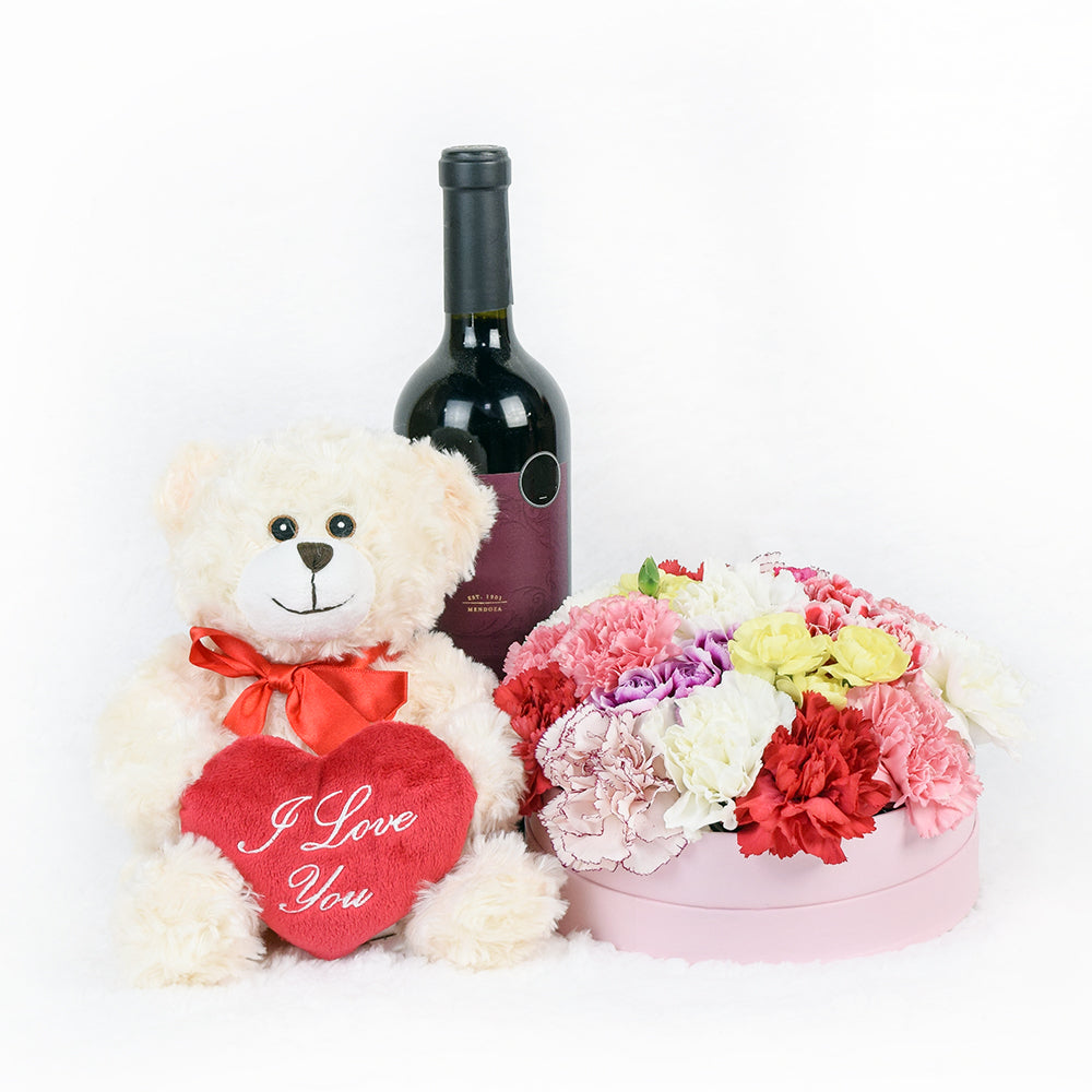 Red Wine and Mixed Carnation Floral Arrangement in Pink Hat Box – how the gift is presented