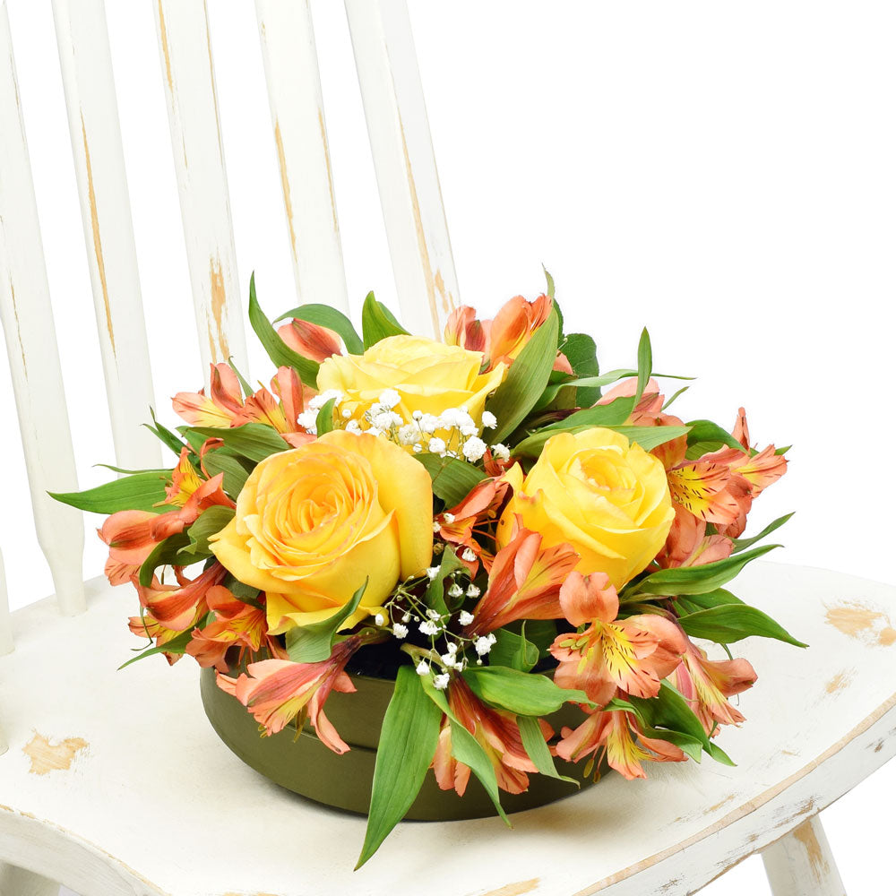Sunshine Yellow Rose & Alstroemeria Hat Box Arrangement – how the gift is presented