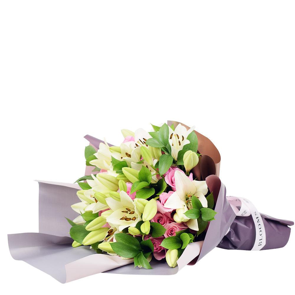 Elegant Pink Roses & Lilies Gathered Bouquet – how the gift is presented