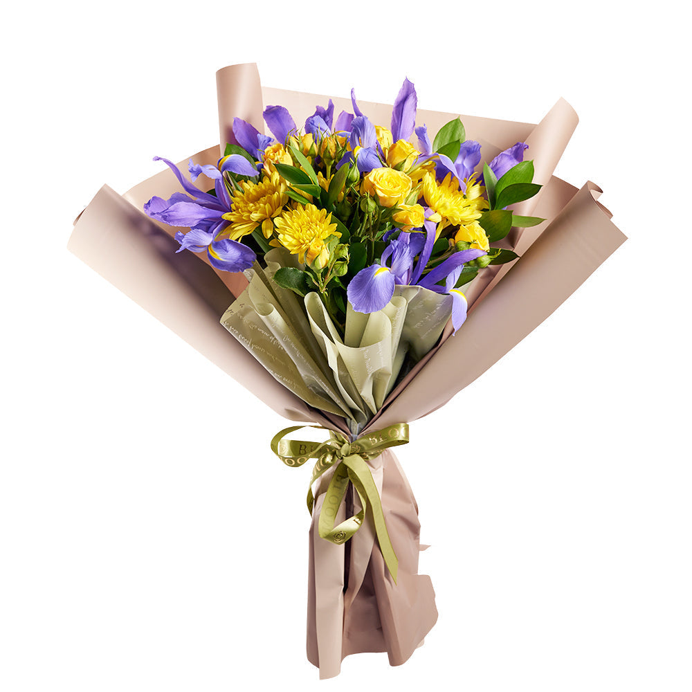 Vibrant Iris, Spray Rose, and Daisy Floral Wrap Bouquet – how the gift is presented