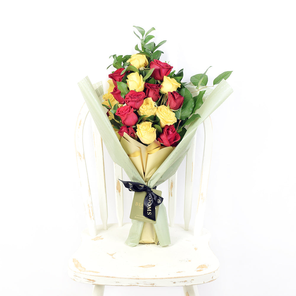 24-Stem Red & Yellow Rose Bouquet in Floral Wrap – how the gift is presented