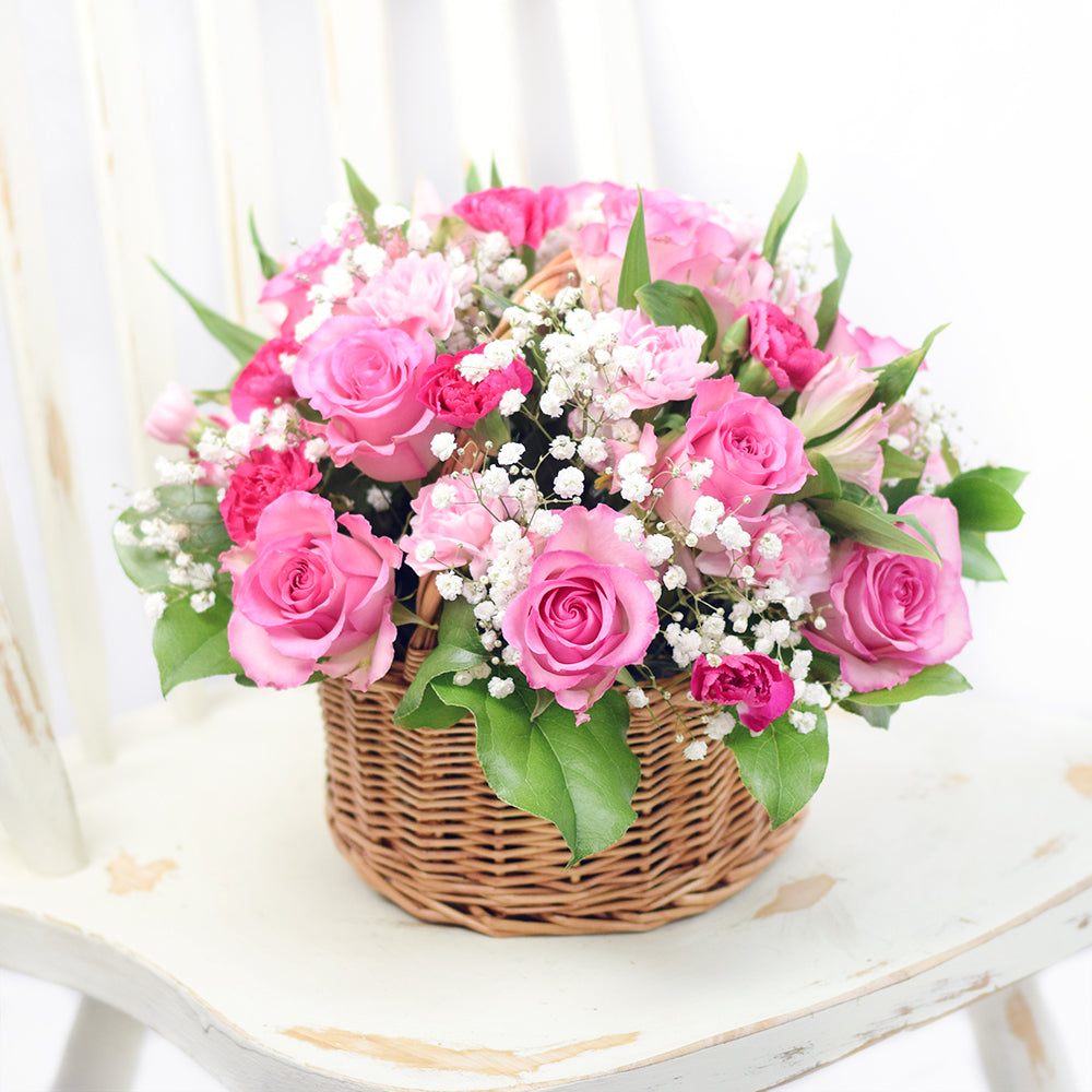 Seasonal Spring Floral Basket with Pink Roses and Salal – how the gift is presented