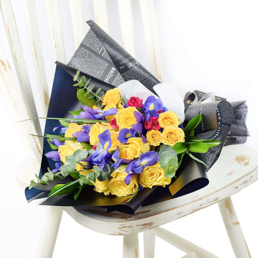 Colorful Roses and Spray Roses Mixed Floral Wrap Bouquet – how the gift is presented