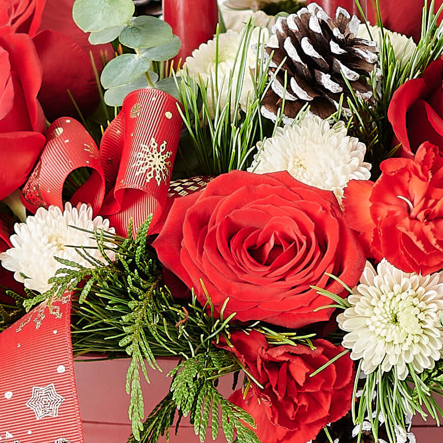 Large Holiday Floral Arrangement with Candles and Pinecones – how the gift is presented