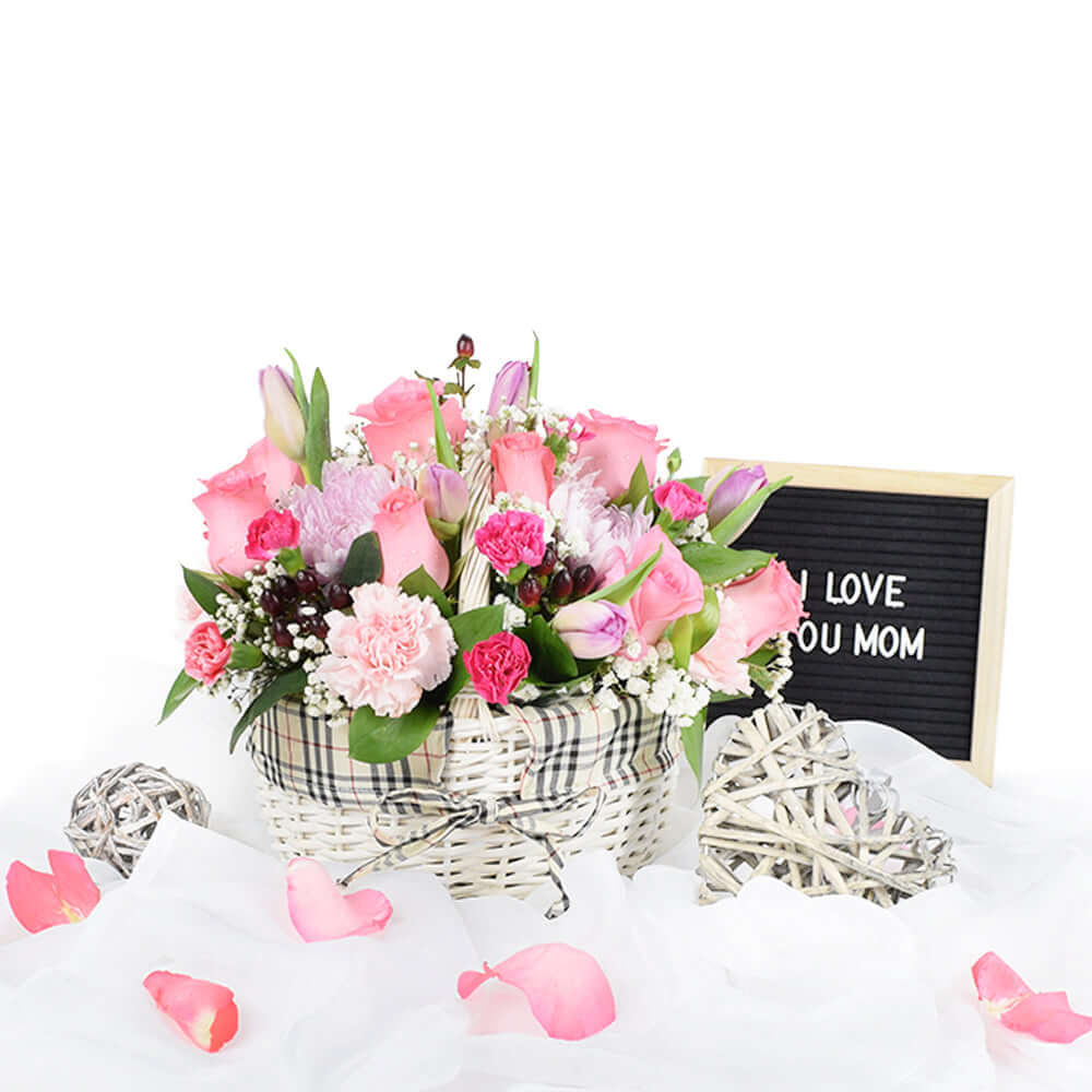 the Pink Flower Basket Arrangement from Connecticut Blooms is perfect for Valentine's Day,