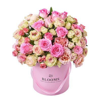 This large floral gift features pink and white roses gathered into a pink hat box for a wonderful way to breath of spring in any space. Connecticut Delivery