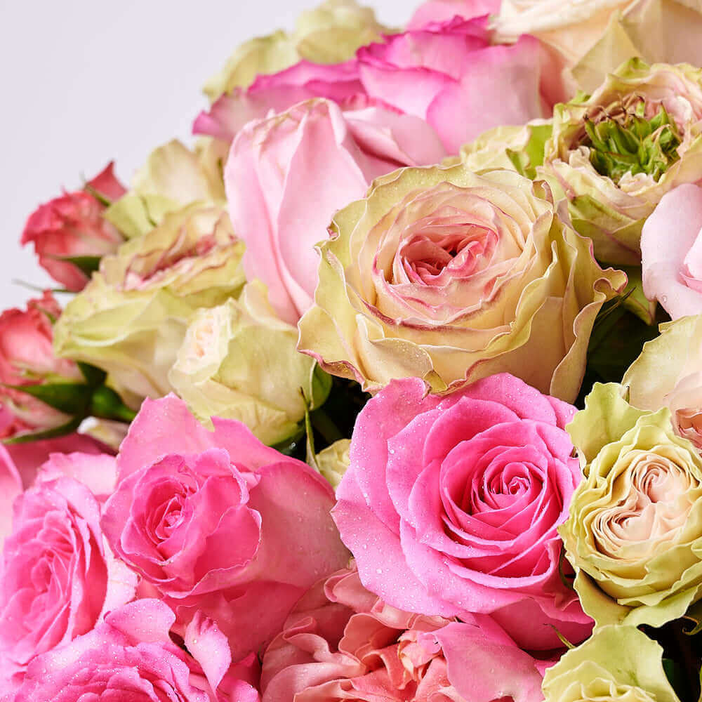 This large floral gift features pink and white roses gathered into a pink hat box for a wonderful way to breath of spring in any space. Connecticut Delivery