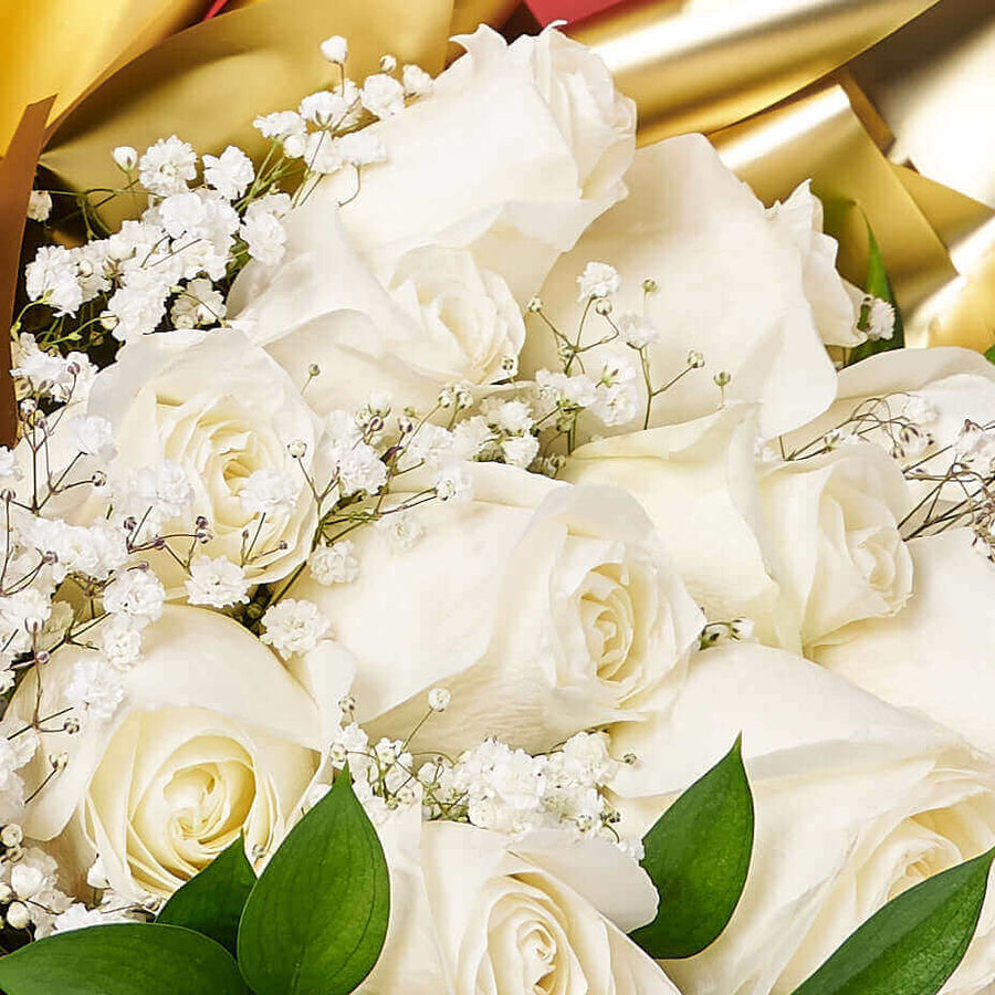 A pure love needs no frills, which is why the Valentine’s Day 12 Stem White Rose Bouquet is a great way to celebrate with stunning simplicity.
