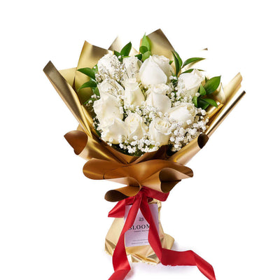 A pure love needs no frills, which is why the Valentine’s Day 12 Stem White Rose Bouquet is a great way to celebrate with stunning simplicity.
