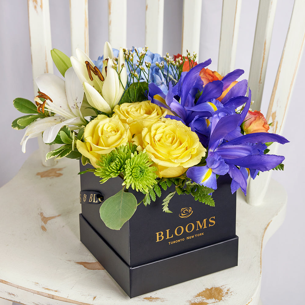 Mixed Iris and Rose Hat Box – how the gift is presented