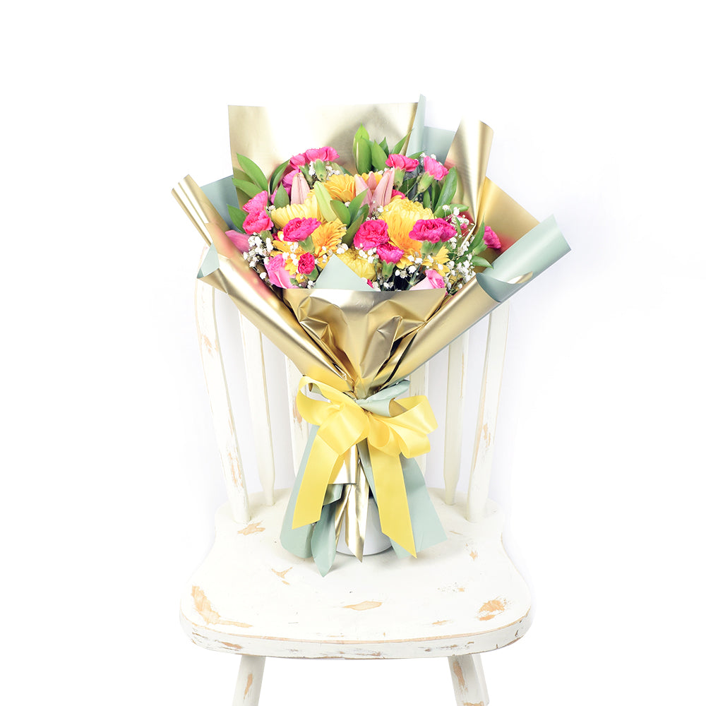 Elegant Pink and Yellow Mixed Bouquet in Floral Wrap – how the gift is presented