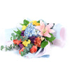 The Festive Purim Bouquet from Connecticut Blooms features a cheerful arrangement of roses, cremons and other flowers tied with a designer ribbon