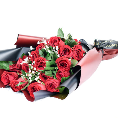 This bouquet includes a selection of deep red roses, baby’s breath, and ruscus gathered in floral wrap with designer ribbon. Connecticut Delivery