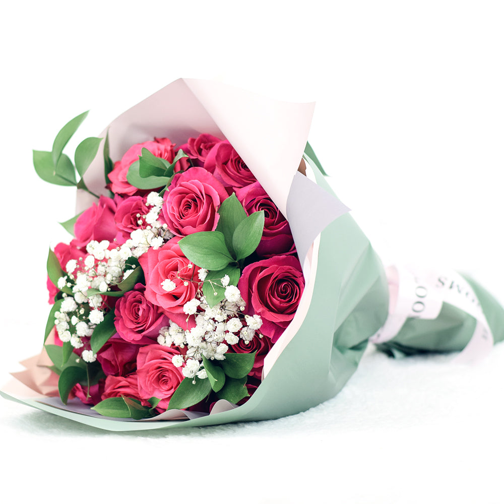 Fun and flirty, the Pink Passion Rose Bouquet by Connecticut Blooms is the perfect gift for the woman in your life who has a love for all things pink.