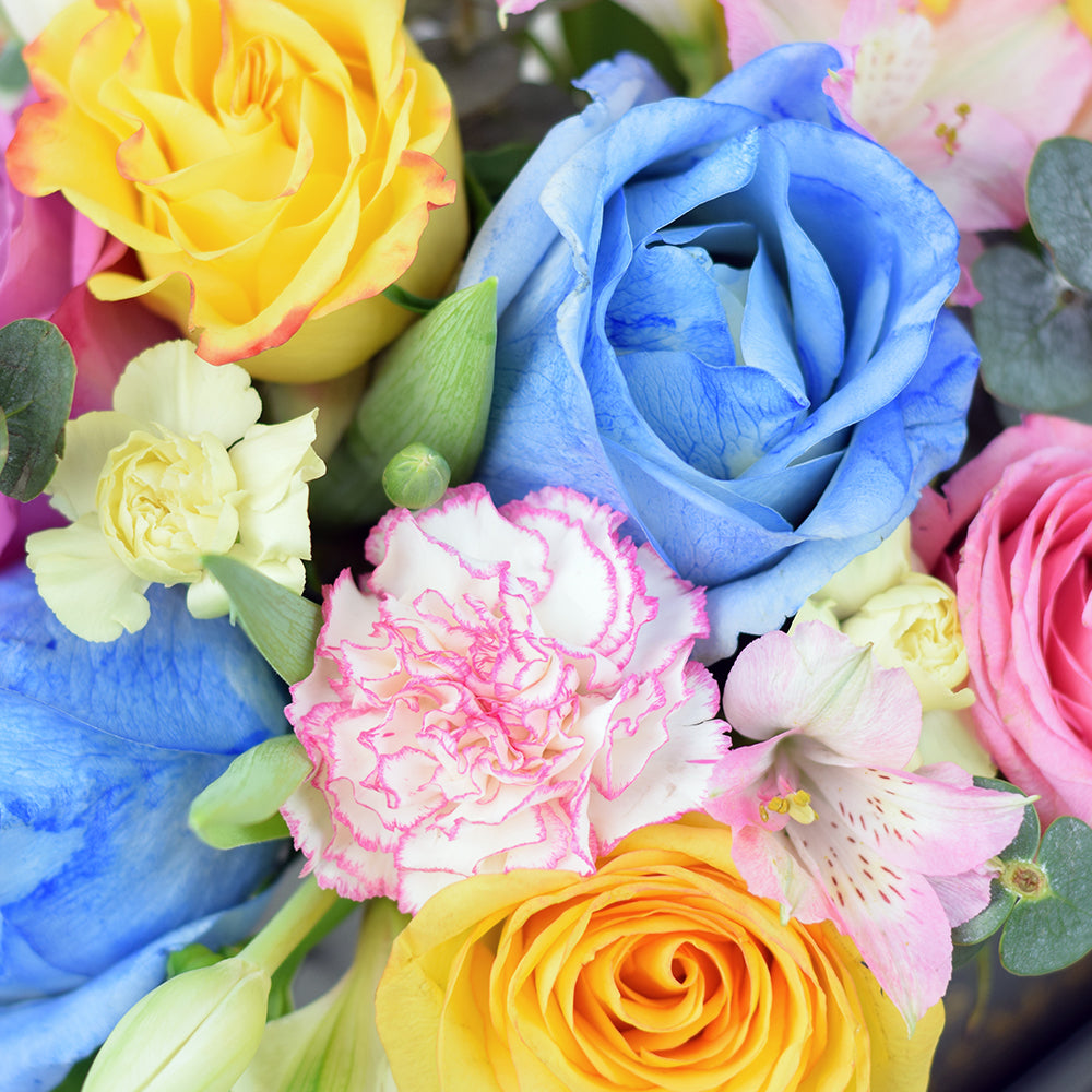 Vibrant Multi-Hued Roses and Tulips Mixed Arrangement – how the gift is presented