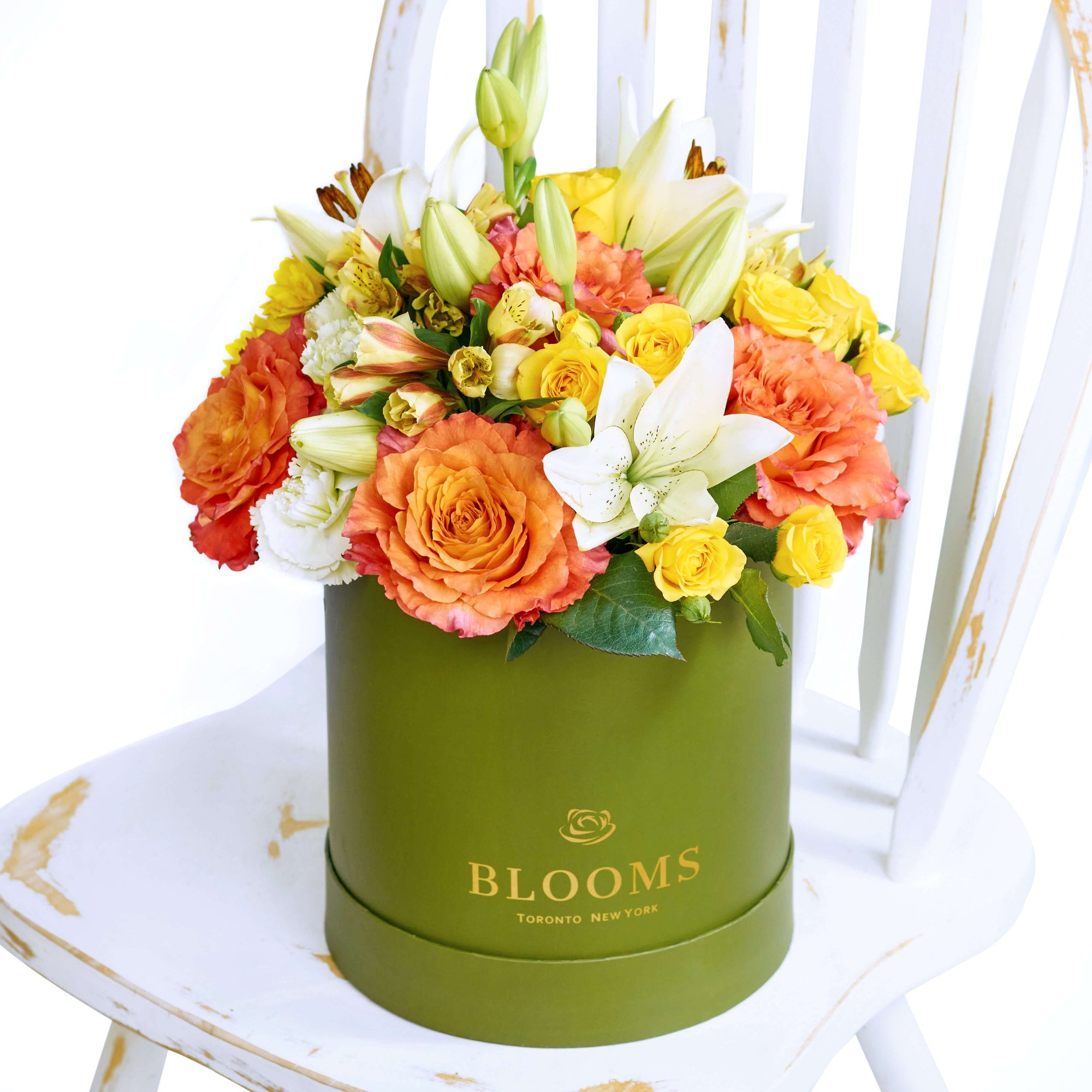 The Summer Glow Mixed Arrangement features a selection of beautiful roses, lilies, daisies, alstroemeria and carnations in a sleek designer box – ready to be delivered to your loved ones on any special occasion.  Connecticut Delivery