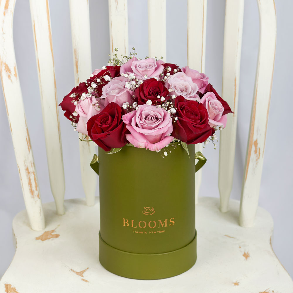 Valentine's Day Rose Arrangement with Pink and Red Blooms – how the gift is presented