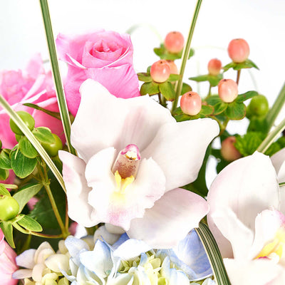 This gift highlights the beauty of hydrangeas, cymbidium orchids, roses, and more in a lovely hat box that makes a lovely centerpiece.  Connecticut Delivery